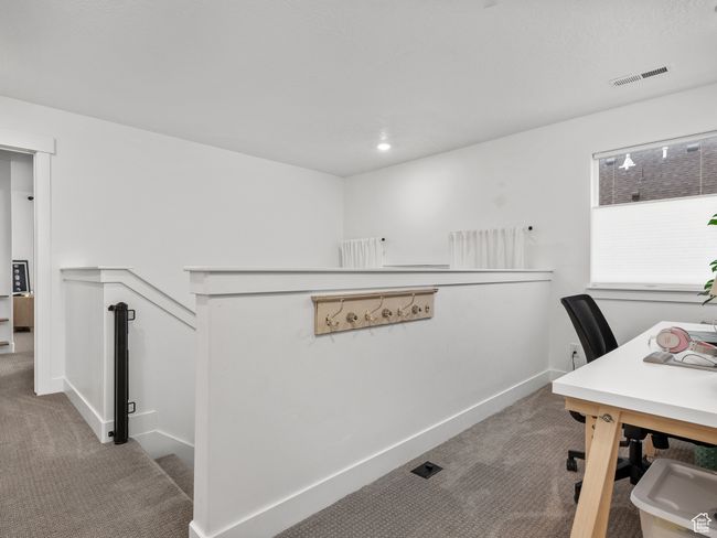 Carpeted office space featuring baseboards | Image 28