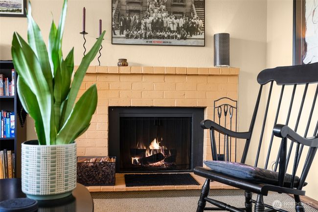 Cozy wood-burning fireplace | Image 8