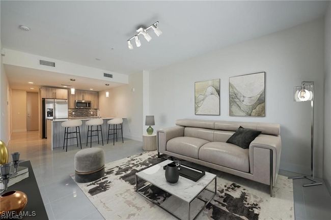 Living area with baseboards, visible vents, recessed lighting, and light tile patterned flooring | Image 14