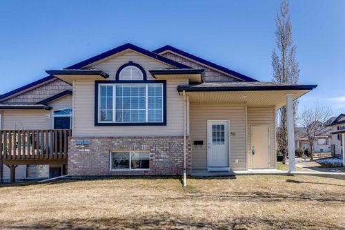 59 - 103 Addington Drive, Home with 2 bedrooms, 1 bathrooms and 2 parking in Red Deer AB | Card Image