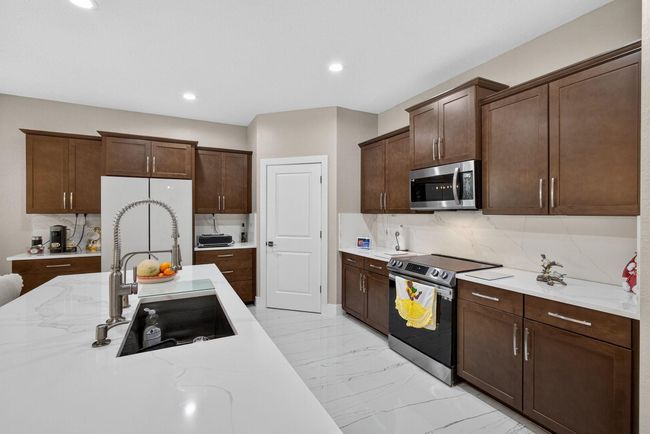 12041 Cypress Key Way, House other with 5 bedrooms, 3 bathrooms and null parking in Royal Palm Beach FL | Image 10
