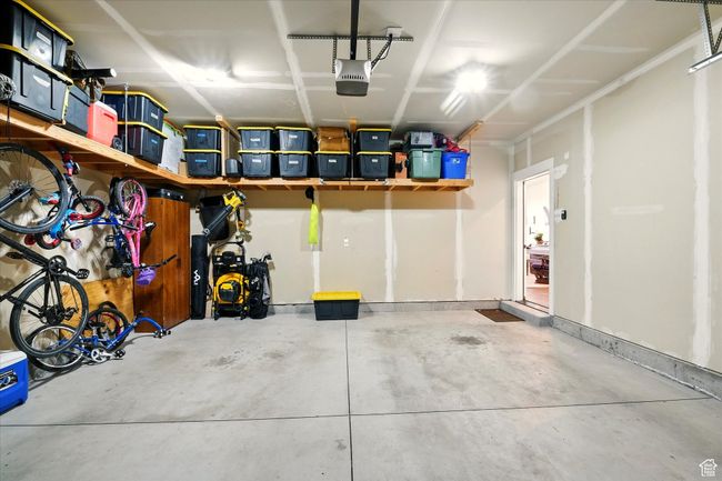 Garage featuring a garage door opener | Image 19