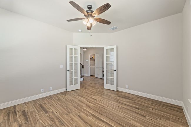 office featuring french doors. This could be a 6th bedroom or a private formal dining | Image 22