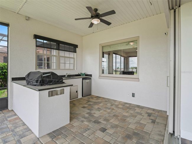 Summer Kitchen w/Window Pass Through to Kitchen | Image 31
