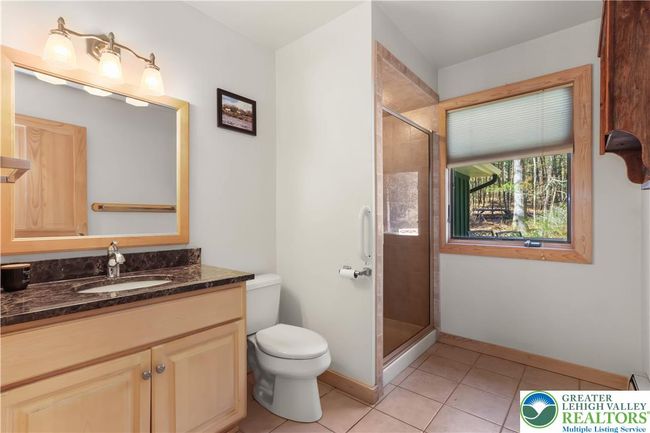 A Full Bath Off the Kitchen and in from Garage | Image 32