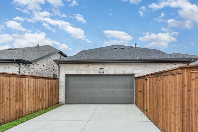 Garage featuring driveway | Image 36