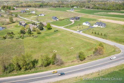 8673 Cannonsburg Rd Ne, Ada, MI, 49301-9729 | Card Image