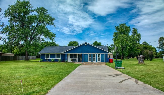 View of front of home with driveway and a porch | Image 5