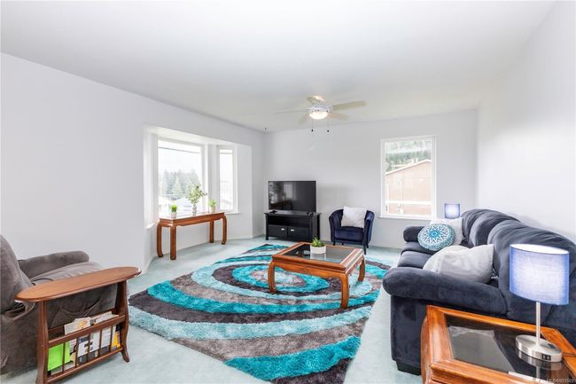 Living room with corner windows to take in the mountain views | Image 19