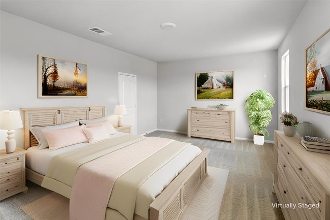 Bedroom featuring light carpet and baseboards | Image 10