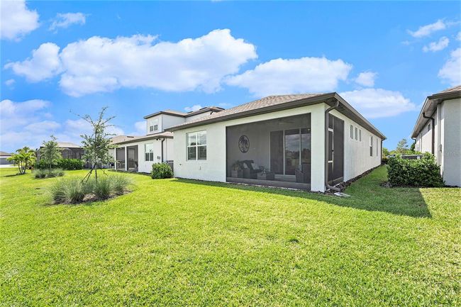 Less seen features include gutters, in wall pest control, HOA managed landscaping, cable, and internet, hurricane shutters, video surveillance, SMART HOME FEATURES connected to your phoneor Alexis, natural gas, and an active lifestyle with clubs, fitness activities, and so much more! | Image 20