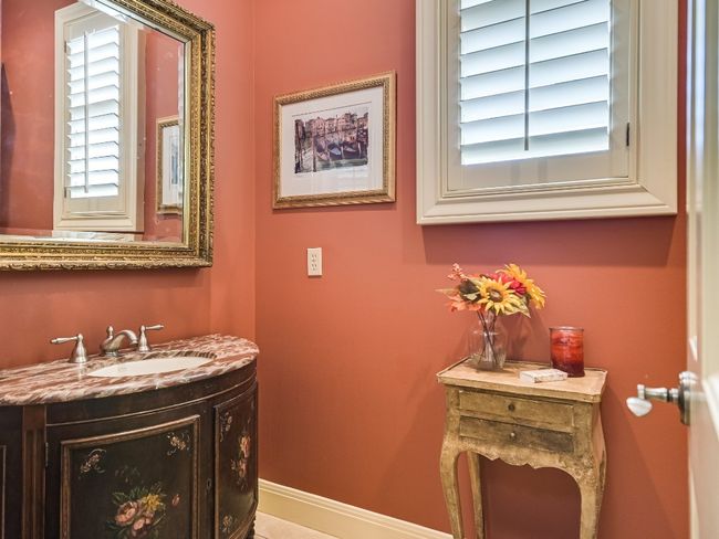 Bathroom with vanity, plenty of natural light, and baseboards | Image 11