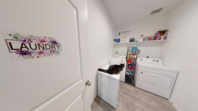 The laundry room is very spacious, as you see in this picture, there is enough room for a freezer and still plenty of room left. | Image 21