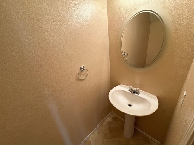 Bathroom featuring tile flooring | Image 9