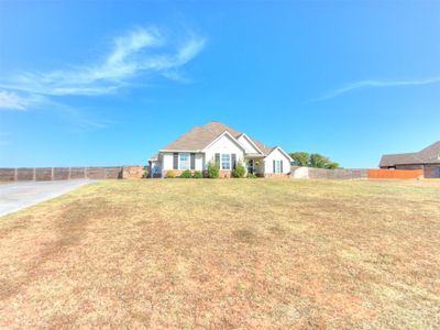 View of front facade with a front lawn | Image 2