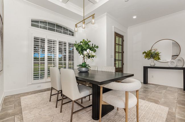 Dining space featuring crown molding and recessed lighting | Image 9