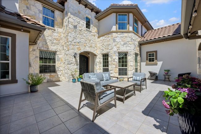 View of patio featuring an outdoor living space | Image 6
