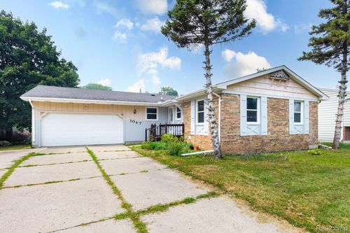 1047 Coolidge Rd, Lansing, MI, 48912-5002 | Card Image