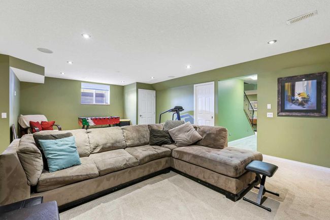 716 Boulder Creek Drive Se, House other with 4 bedrooms, 4 bathrooms and 4 parking in Langdon AB | Image 31
