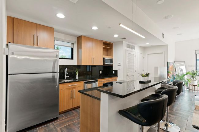 KITCHEN WITH STAINLESS STEEL APPLIANCES | Image 29