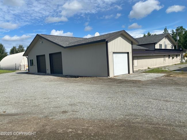 Main building - exterior garage area | Image 4