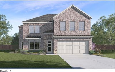 Front of property with a garage and a front lawn | Image 1