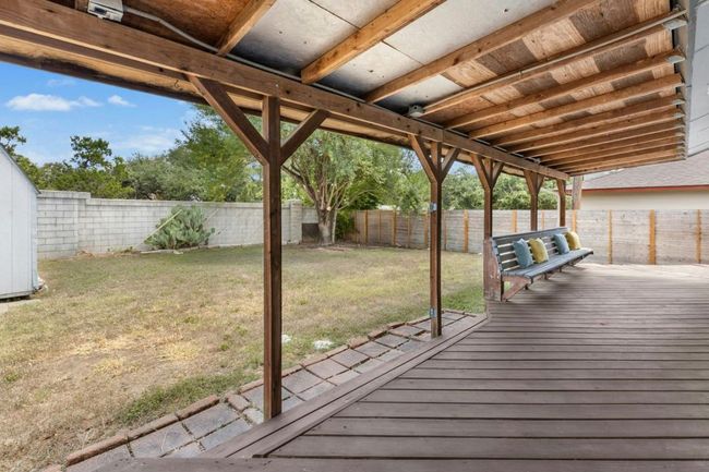 Deck featuring a fenced backyard | Image 31