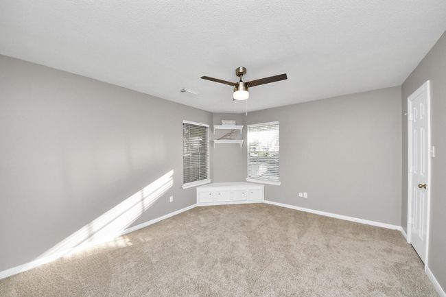 Bedroom 3 with window seat and ensuite bath. All the bedrooms have walk-in closets too! | Image 29