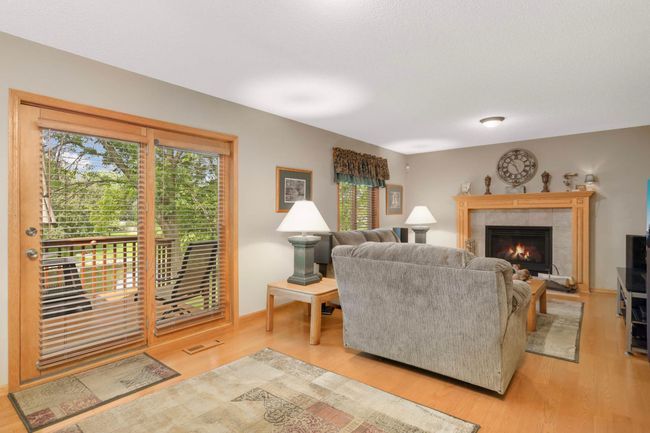 Living room area with access to deck. | Image 19