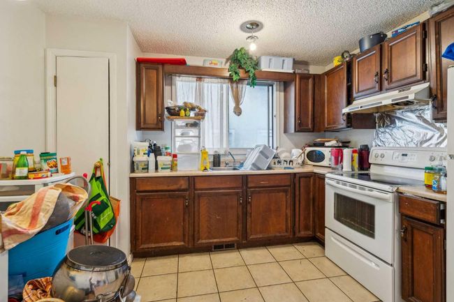 509 and 511 13 Avenue Ne, Home with 5 bedrooms, 2 bathrooms and 3 parking in Calgary AB | Image 8