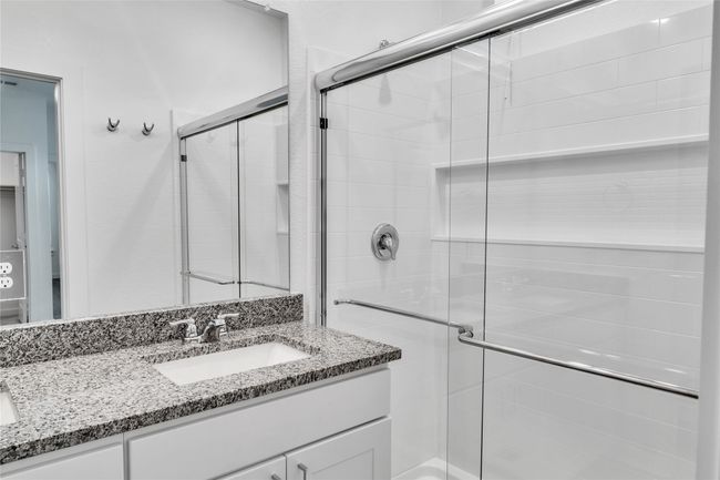 Full bath with a shower stall and vanity | Image 7