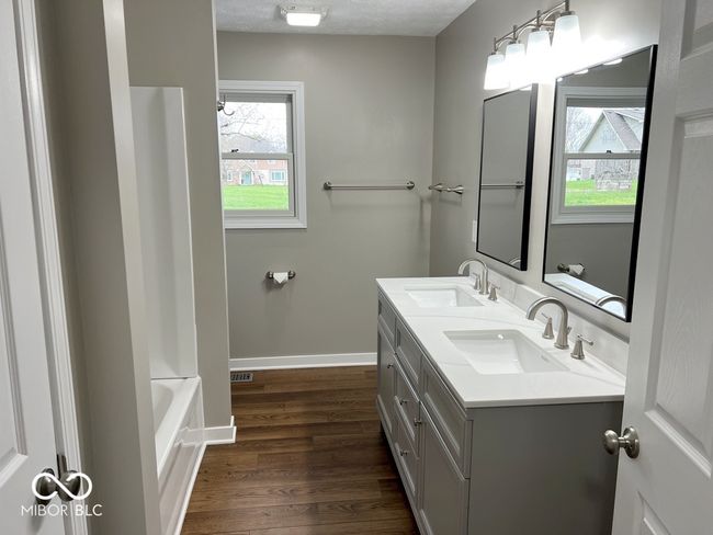 Totally updated Hall bathroom with double sinks, full tub/shower | Image 27