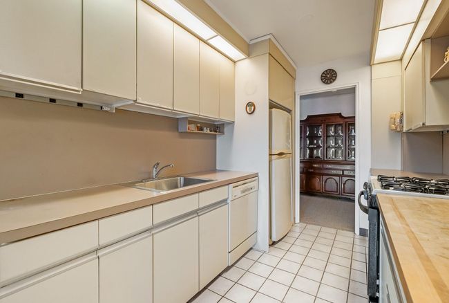 View of galley kitchen | Image 12