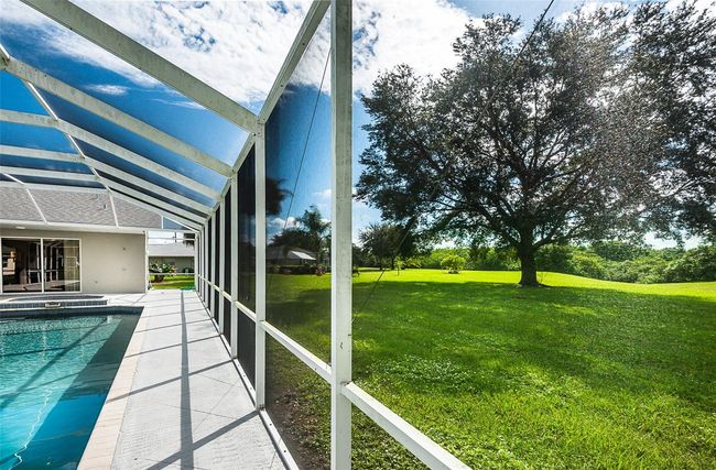 27406 Tierra Del Fuego Cir, House other with 4 bedrooms, 4 bathrooms and null parking in PUNTA GORDA FL | Image 67