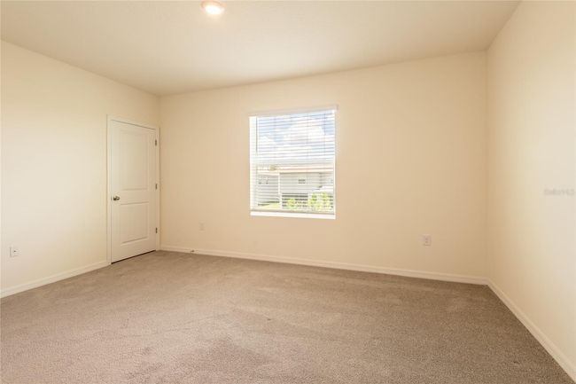 33063 Tulip Petal Ln, Townhouse with 3 bedrooms, 3 bathrooms and null parking in WESLEY CHAPEL FL | Image 36