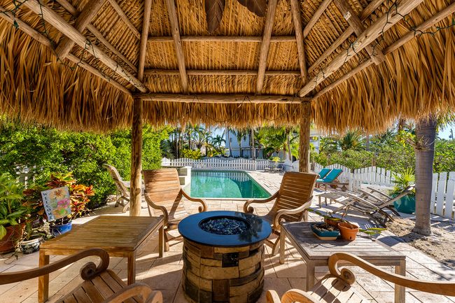 Rare tiki hut next to pool | Image 50