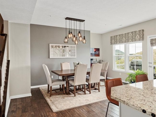 Open to both the kitchen and living areas, this space is perfect for effortless entertaining and everyday comfort. | Image 10