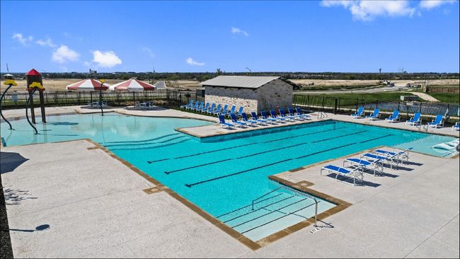 Community pool featuring a patio | Image 21