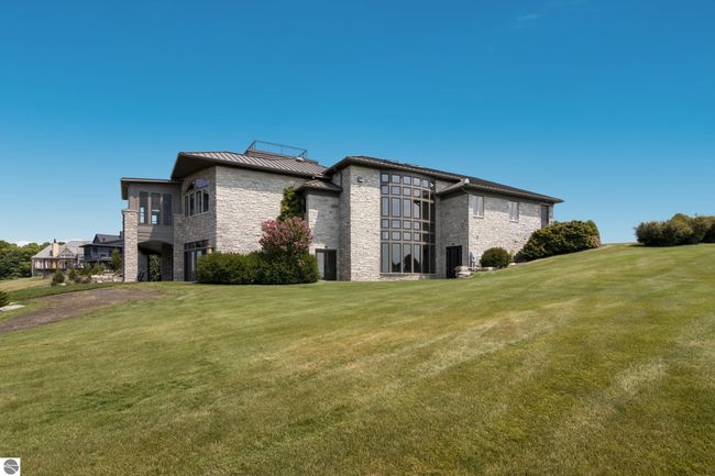 4173 Dornoch Ct, House other with 6 bedrooms, 4 bathrooms and null parking in Williamsburg MI | Image 63