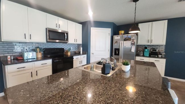 7938 Broad Pointe Dr, House other with 4 bedrooms, 2 bathrooms and null parking in ZEPHYRHILLS FL | Image 9