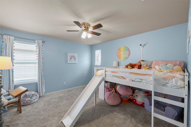Bedroom featuring carpet floors and ceiling fan | Image 28