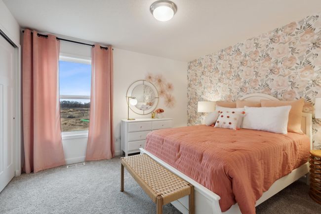 (Photo of decorated model, actual home's finishes may vary slightly) One of three generously sized bedrooms. | Image 13