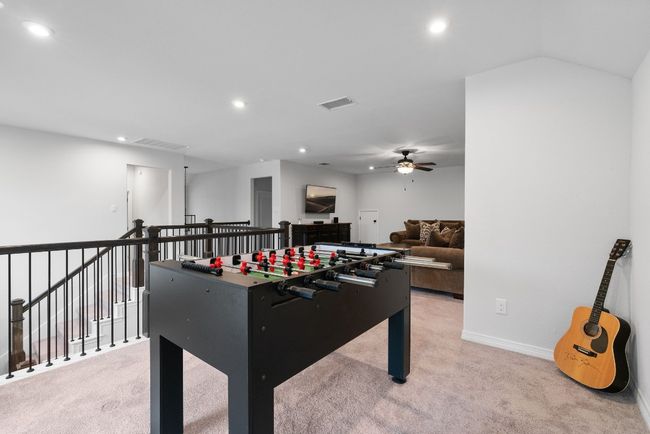 An extended game area within the loft space for additional activities and fun/play. | Image 27