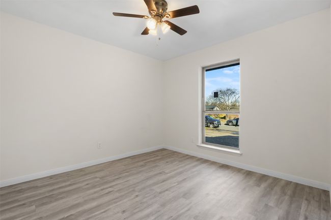Empty room featuring light hardwood / wood-style floors and ceiling fan | Image 18