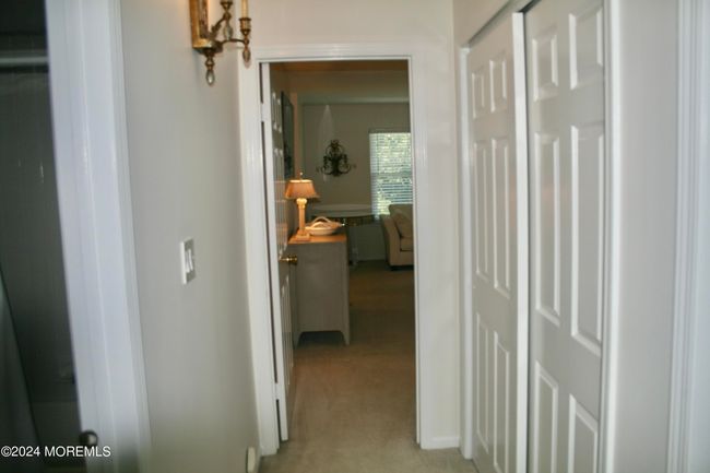 2nd floor hallway with double closet | Image 14