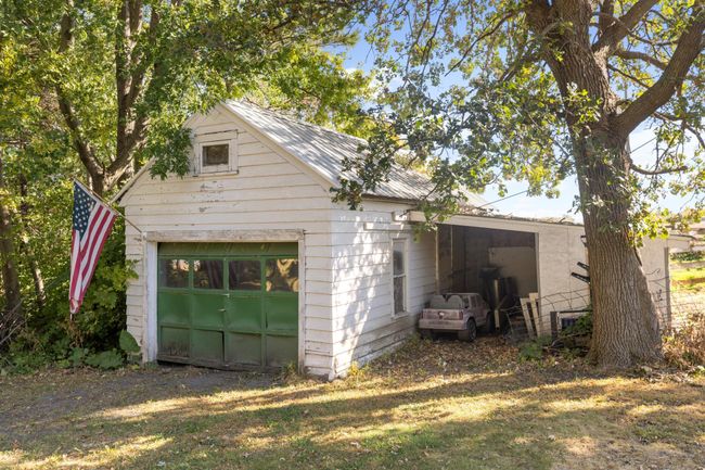 Detached one car garage with lean to. | Image 24