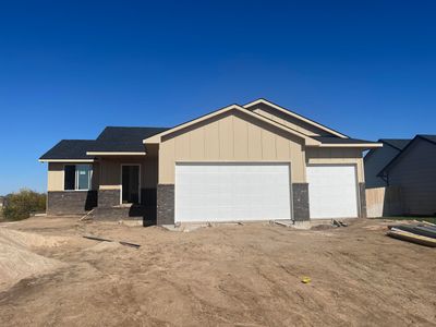 View of front of home featuring a garage | Image 1