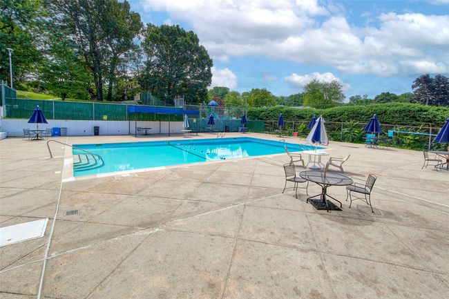 Community pool featuring a patio area | Image 20