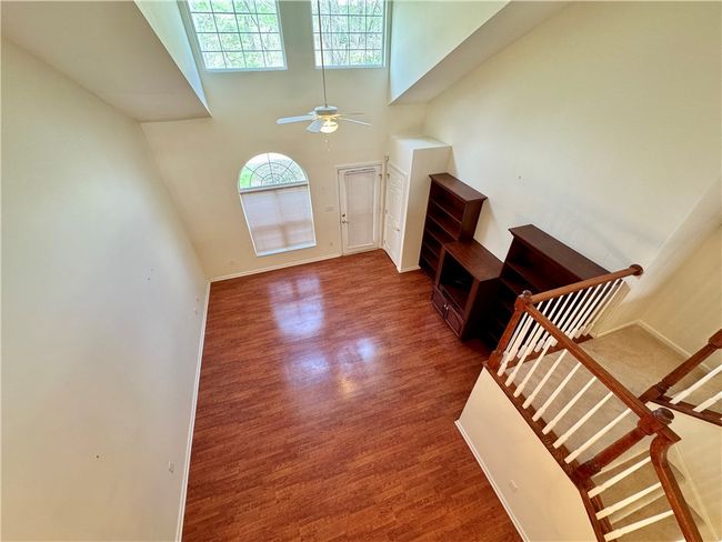 View of living room from loft. | Image 5