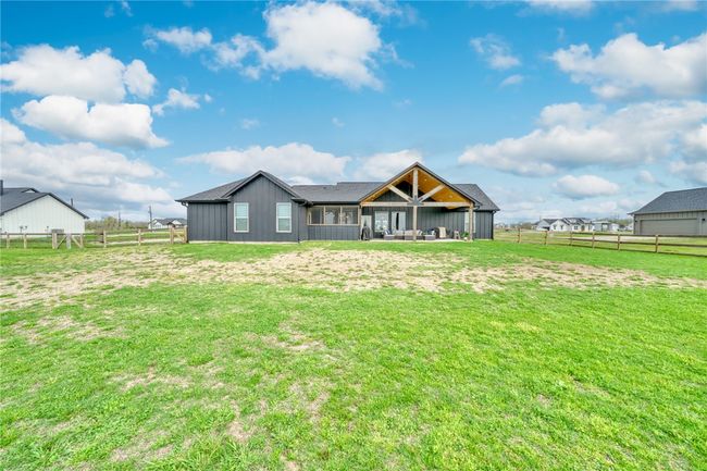 Rear view of property featuring a lawn | Image 39